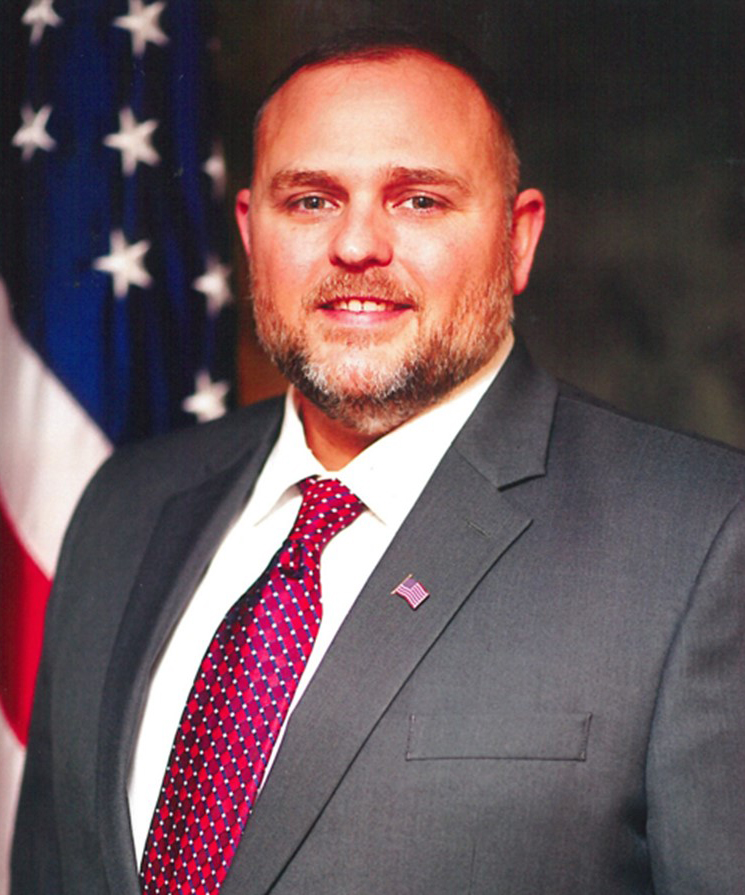 Mr. Michael Mounce, Director